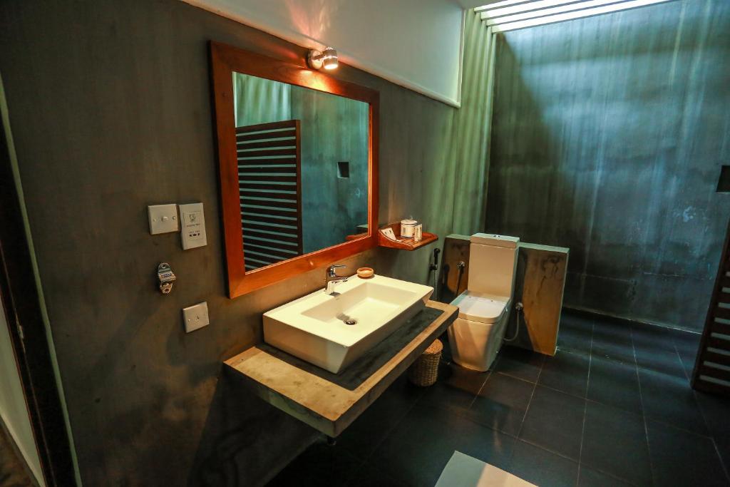 Koupelna v ubytování Camellia Resort and Spa