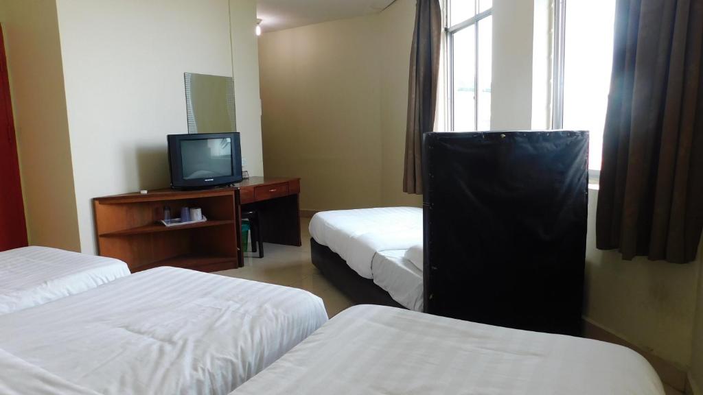 TV a/nebo společenská místnost v ubytování Hotel Ocean