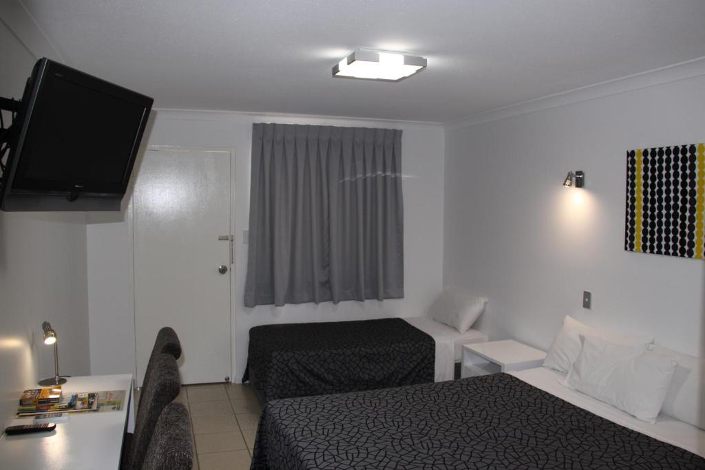 Postel nebo postele na pokoji v ubytování Park View Motel