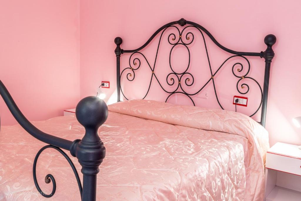 Postel nebo postele na pokoji v ubytování Agriturismo Le Querce