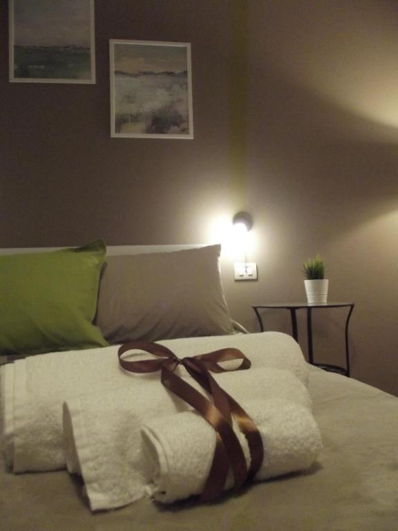 Postel nebo postele na pokoji v ubytování B&B Giulio Cesare