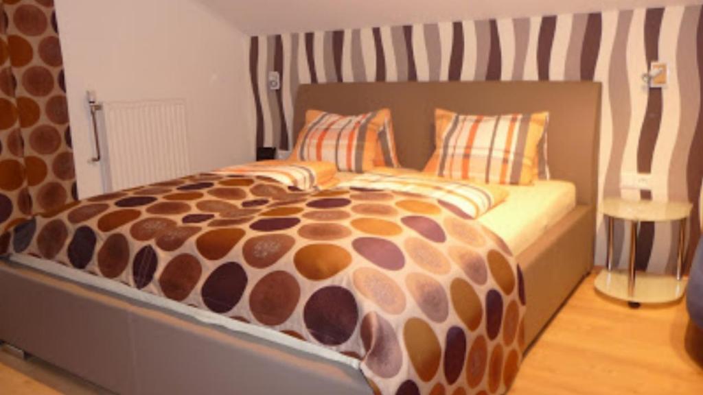 Postel nebo postele na pokoji v ubytování Hotel Gletschermühle
