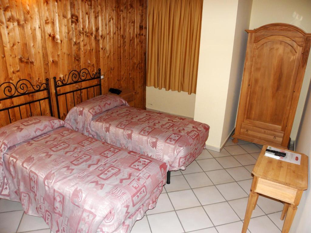 Posteľ alebo postele v izbe v ubytovaní Agriturismo La Colombaia