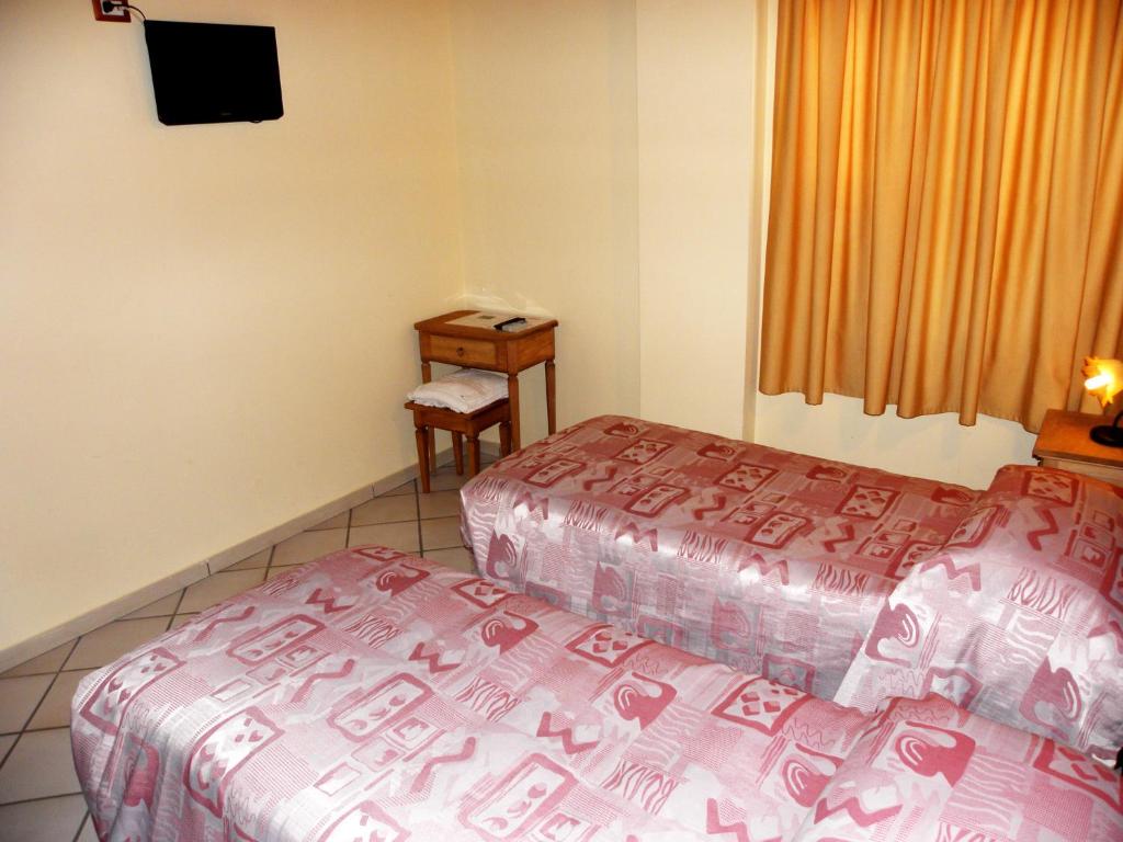 Posteľ alebo postele v izbe v ubytovaní Agriturismo La Colombaia