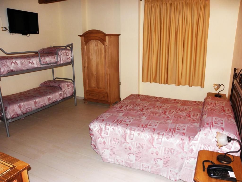 Posteľ alebo postele v izbe v ubytovaní Agriturismo La Colombaia