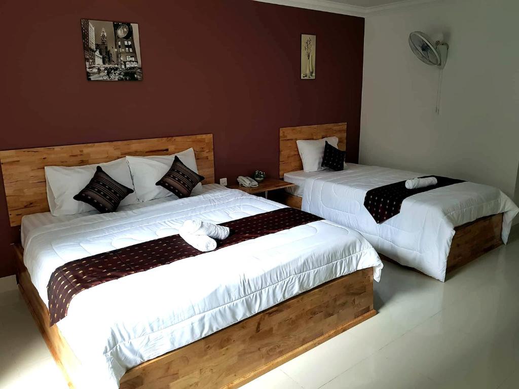 Postel nebo postele na pokoji v ubytování Lucky Hostel