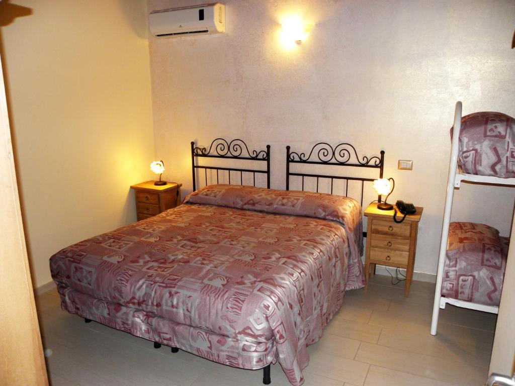 Posteľ alebo postele v izbe v ubytovaní Agriturismo La Colombaia