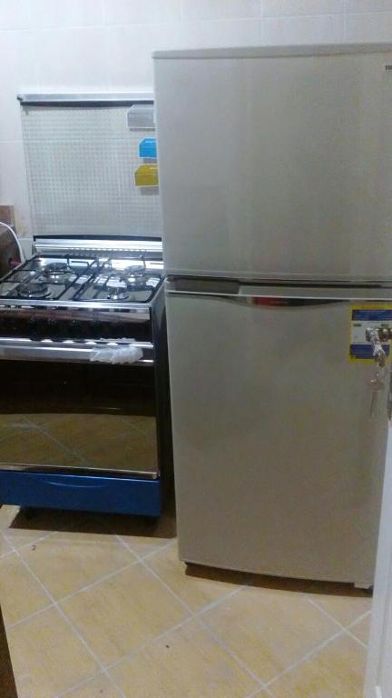 A kitchen or kitchenette at Mohamed Afifi Florence El Montazah - 2 Bed rooms - "Compound"