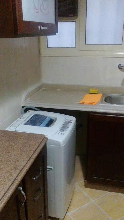 A kitchen or kitchenette at Mohamed Afifi Florence El Montazah - 2 Bed rooms - "Compound"