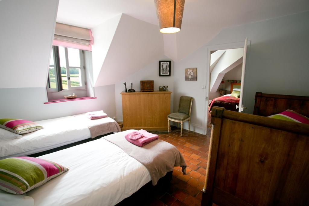 Postel nebo postele na pokoji v ubytování B&B Vassy Etaule