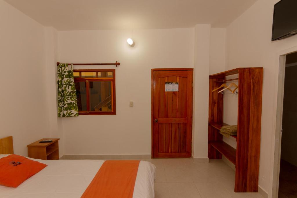 Postel nebo postele na pokoji v ubytování Tuzco Lodge