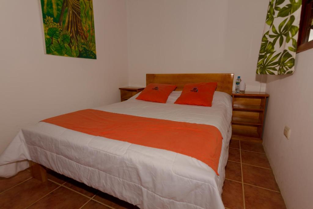 Postel nebo postele na pokoji v ubytování Tuzco Lodge