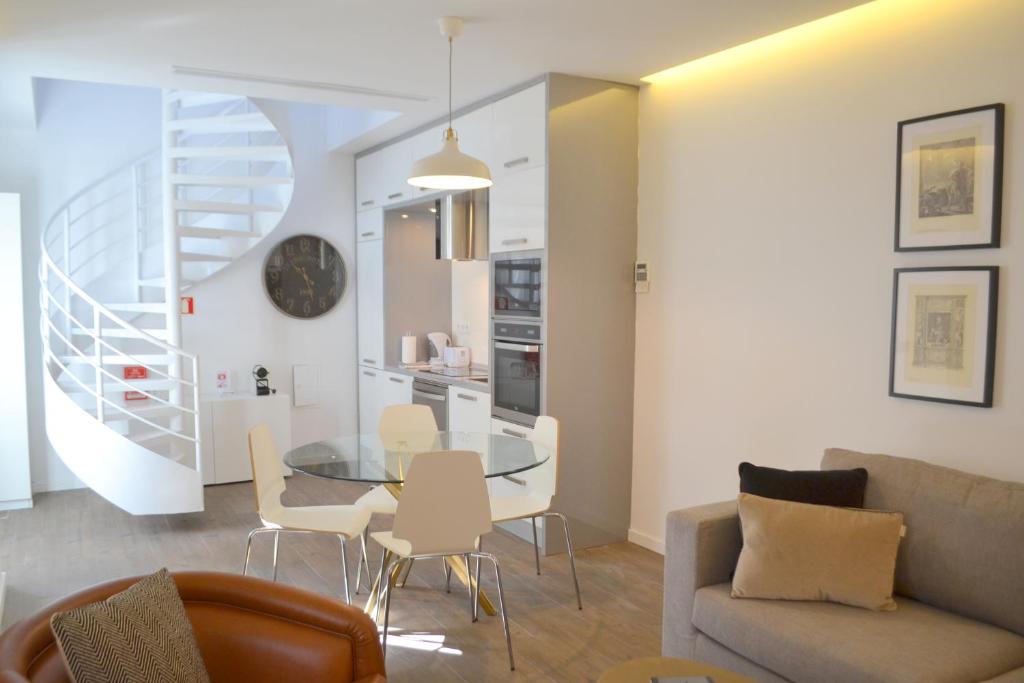 a living room with a couch and a table at TP Aqueduto Lisbon House in Lisbon