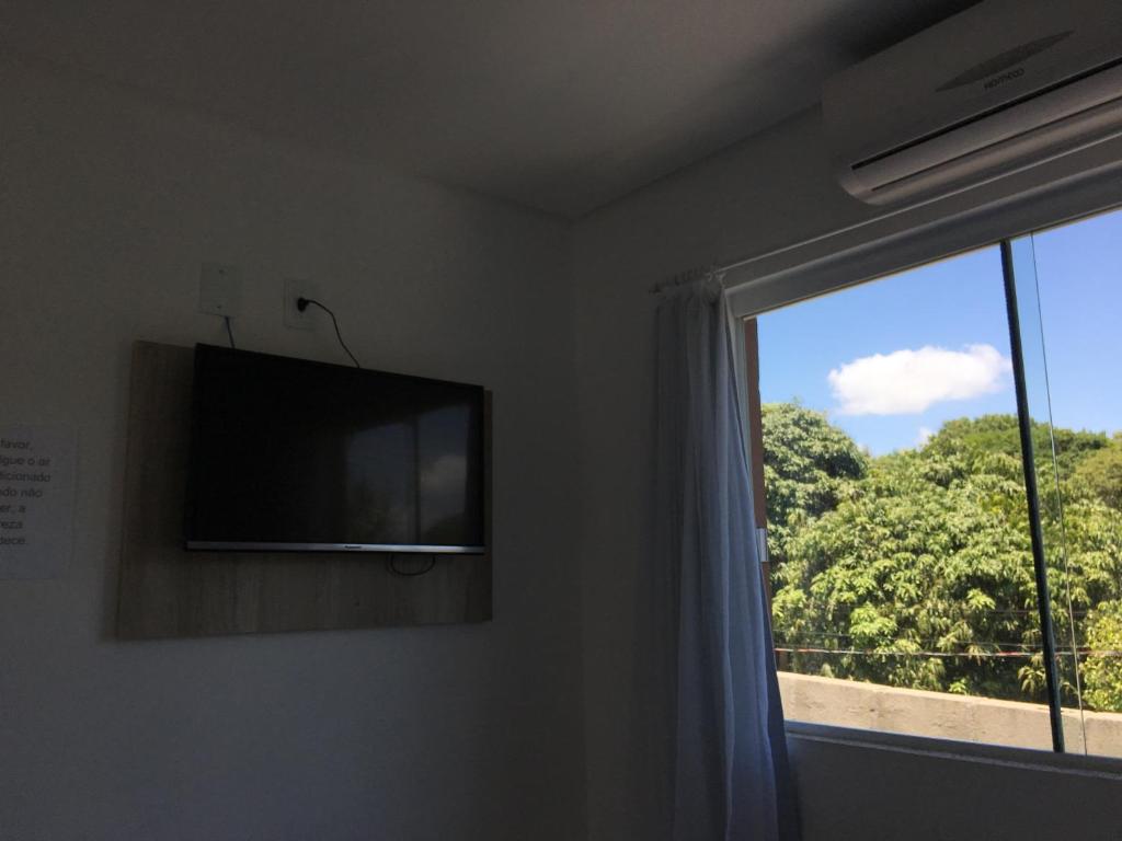 TV a/nebo společenská místnost v ubytování Residencial Neto