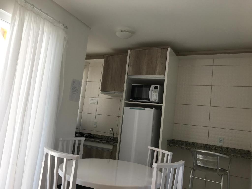 Kuchyň nebo kuchyňský kout v ubytování Residencial Neto