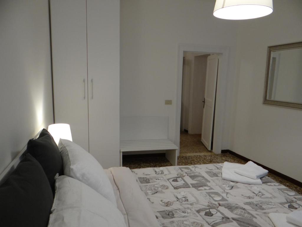 Łóżko lub łóżka w pokoju w obiekcie Palazzo Boldù - Ca' Colombina