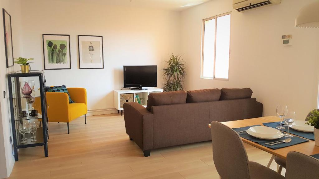 Posezení v ubytování Caputxins Apartment