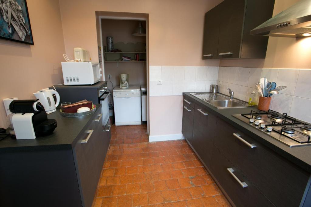 Kuchyň nebo kuchyňský kout v ubytování B&B Vassy Etaule