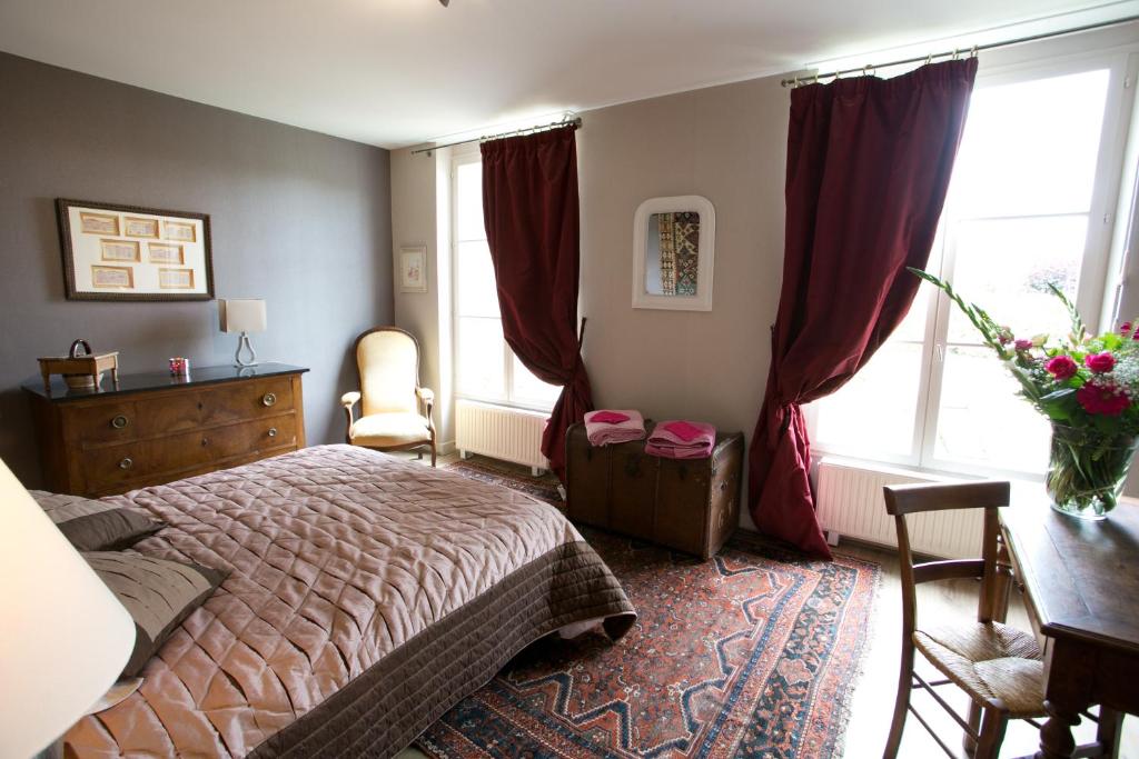 Postel nebo postele na pokoji v ubytování B&B Vassy Etaule