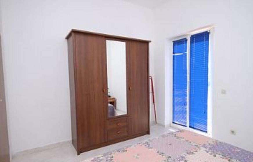 Postel nebo postele na pokoji v ubytování Apartments Angela Ližnjan