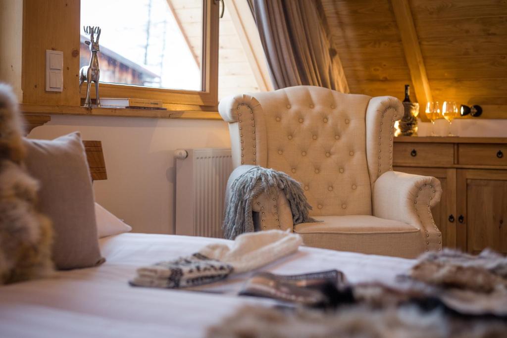 Postel nebo postele na pokoji v ubytování Nosalowski Wypas Jacuzzi & Sauna