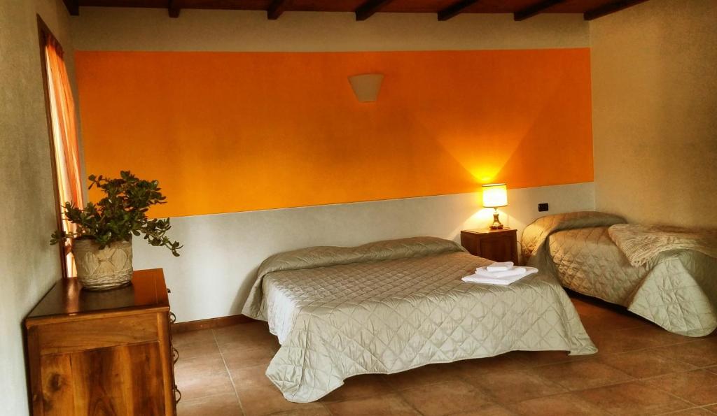 Posteľ alebo postele v izbe v ubytovaní Agriturismo di Sordiglio