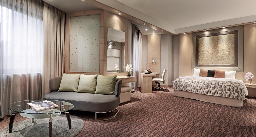 Giường trong phòng chung tại M Hotel Singapore City Centre