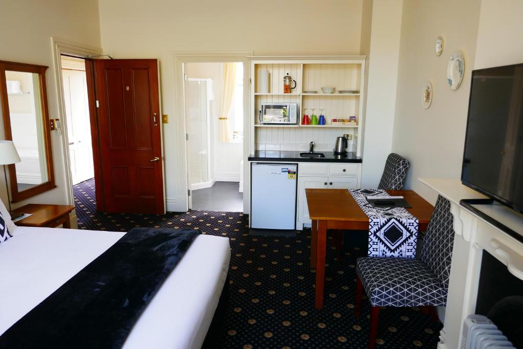 Kuchyň nebo kuchyňský kout v ubytování Highland House Boutique Hotel
