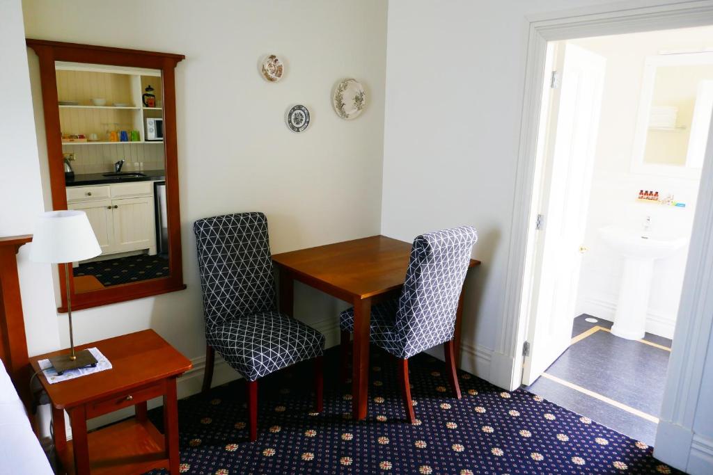 Kuchyň nebo kuchyňský kout v ubytování Highland House Boutique Hotel