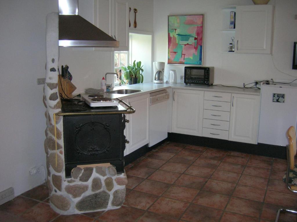 Kuchyň nebo kuchyňský kout v ubytování Vranum Guesthouse