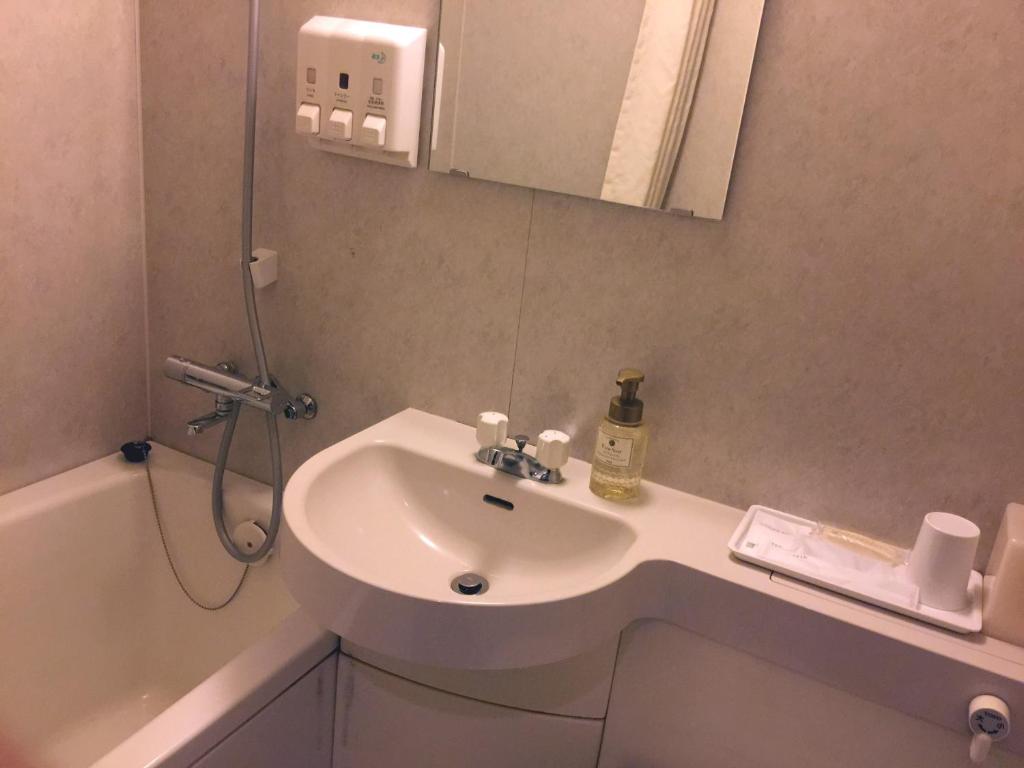 Koupelna v ubytování Sun Palace Hotel