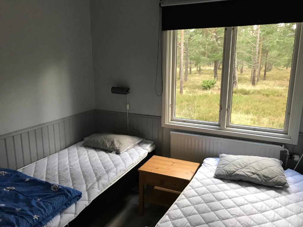 Postel nebo postele na pokoji v ubytování STF Hostel Visby/Rävhagen