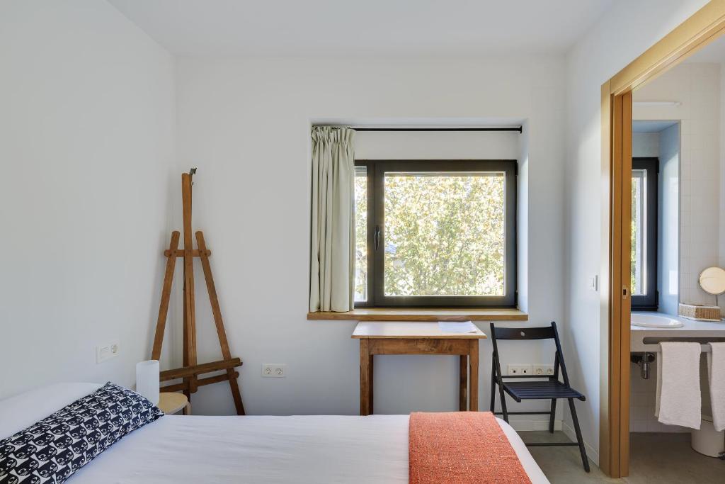 Postel nebo postele na pokoji v ubytování Casa la Devesa de Sanabria