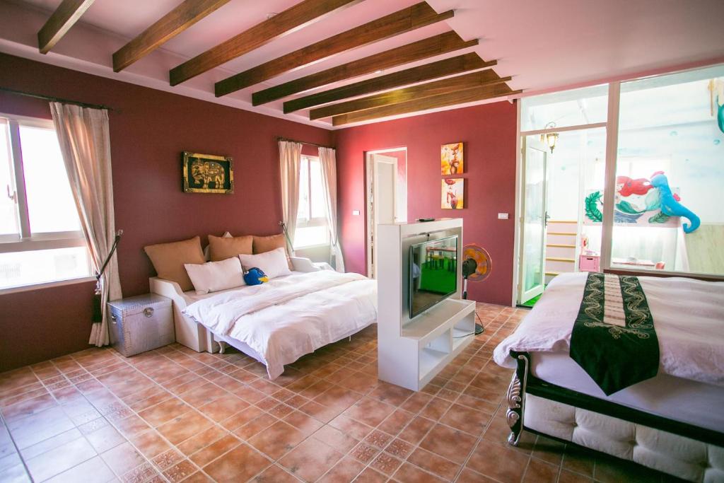 Postel nebo postele na pokoji v ubytování Sharjah B&B