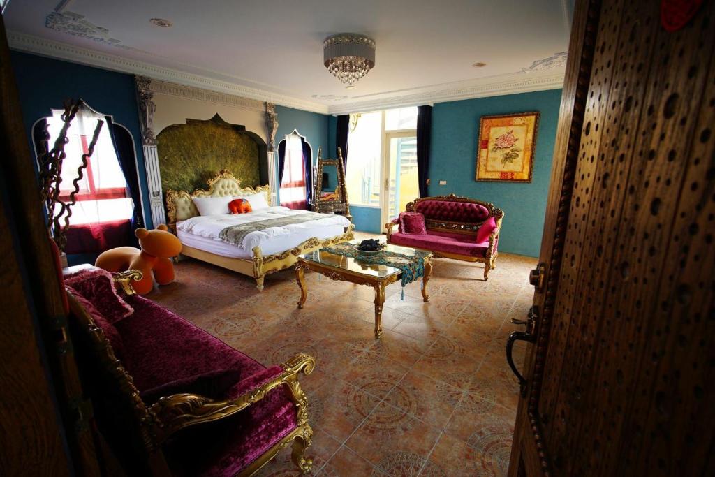 Postel nebo postele na pokoji v ubytování Sharjah B&B