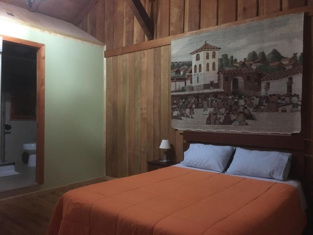 Postel nebo postele na pokoji v ubytování Hostal Kutralwe