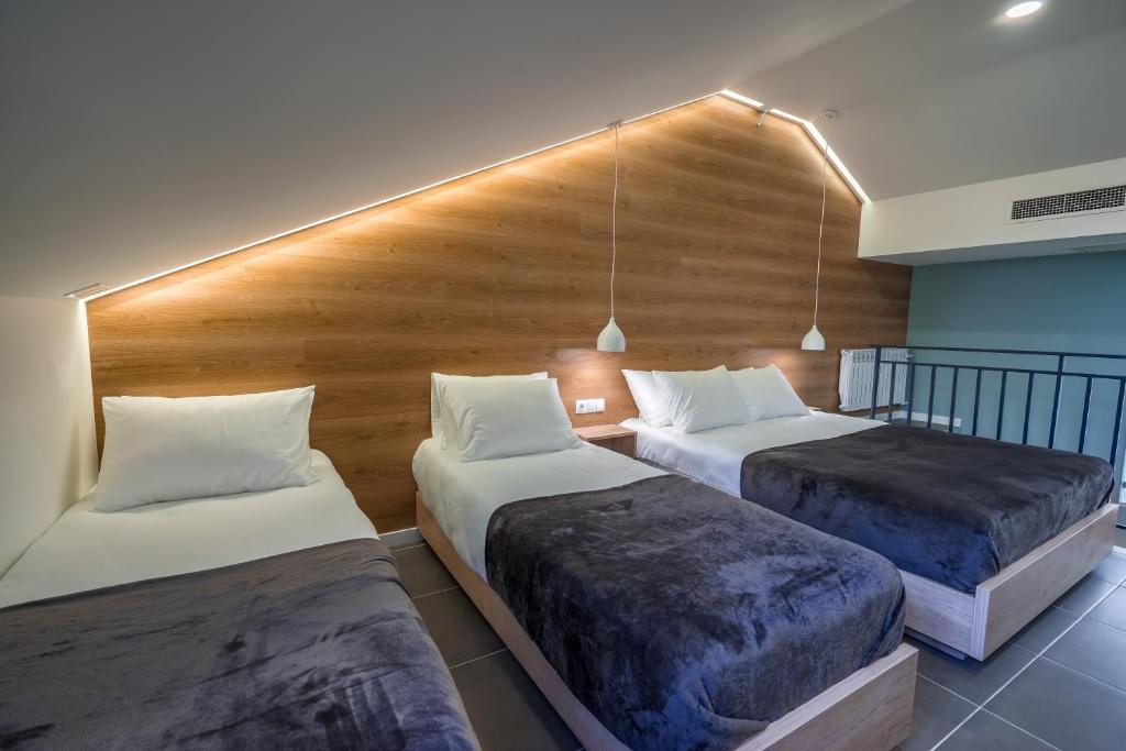 Postel nebo postele na pokoji v ubytování 8 Rooms Apartotel On Meidan