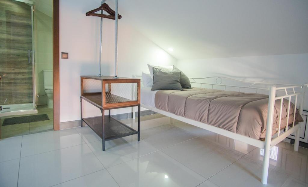 Posteľ alebo postele v izbe v ubytovaní The Lights City Rooms