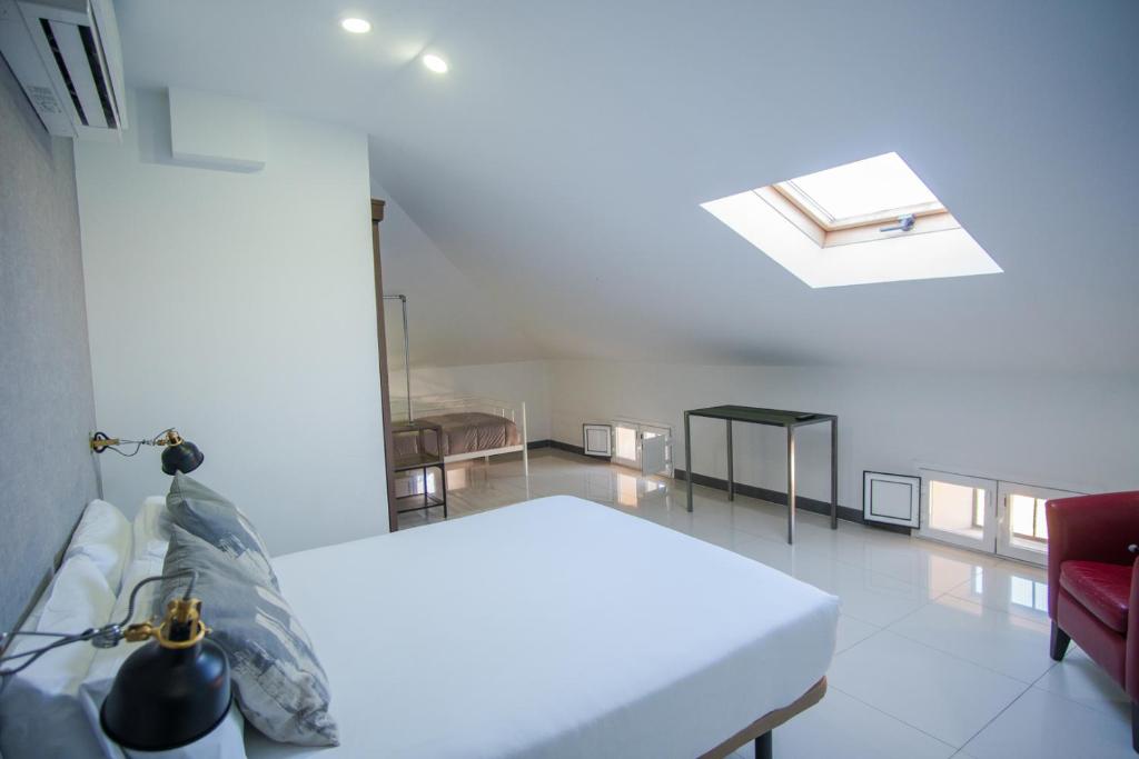 Posteľ alebo postele v izbe v ubytovaní The Lights City Rooms