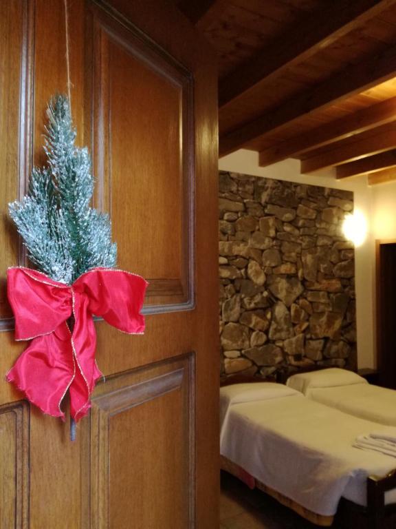 Postel nebo postele na pokoji v ubytování La Corte Albergo