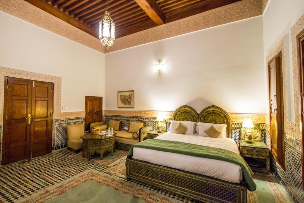 Postel nebo postele na pokoji v ubytování Riad Myra