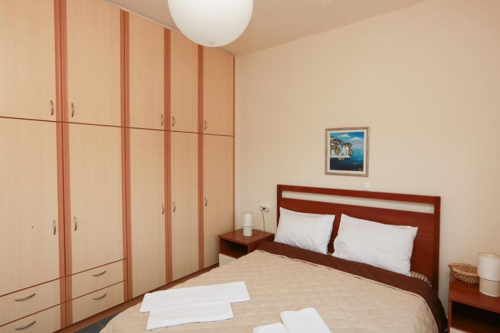 Postel nebo postele na pokoji v ubytování Villa Anemoessa