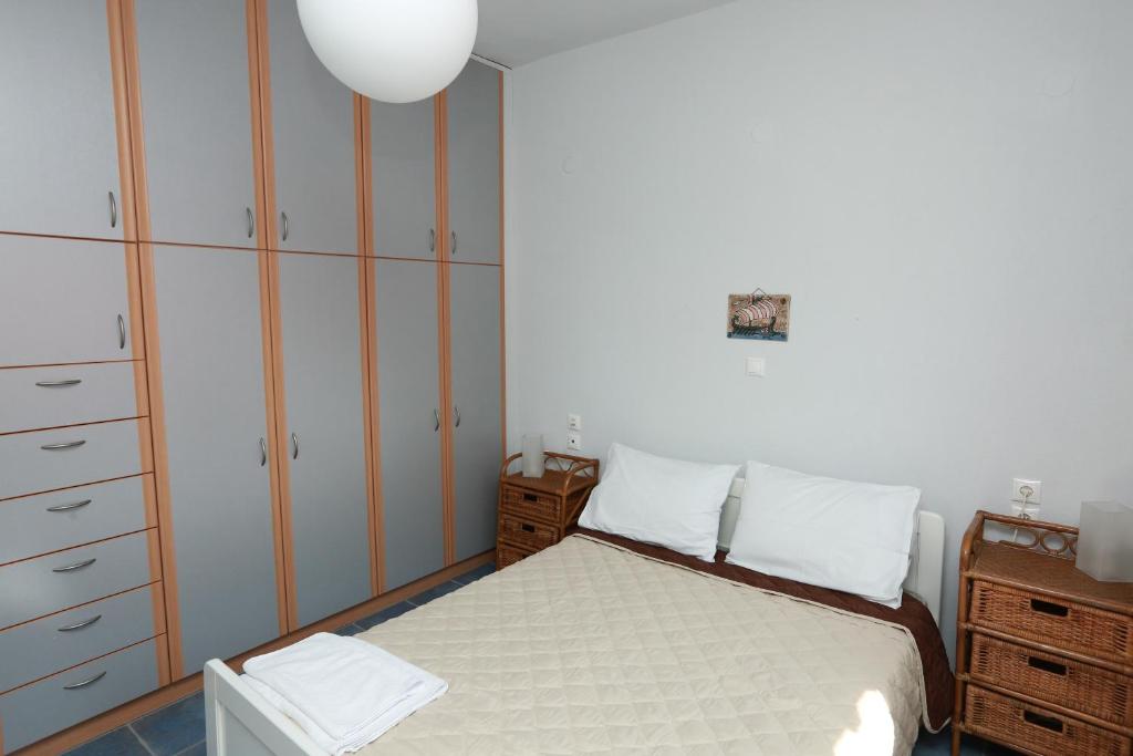 Postel nebo postele na pokoji v ubytování Villa Anemoessa
