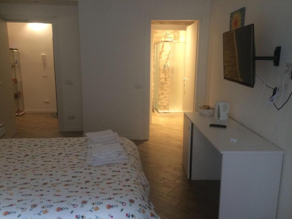 Кровать или кровати в номере B&B Via Fontana Milano