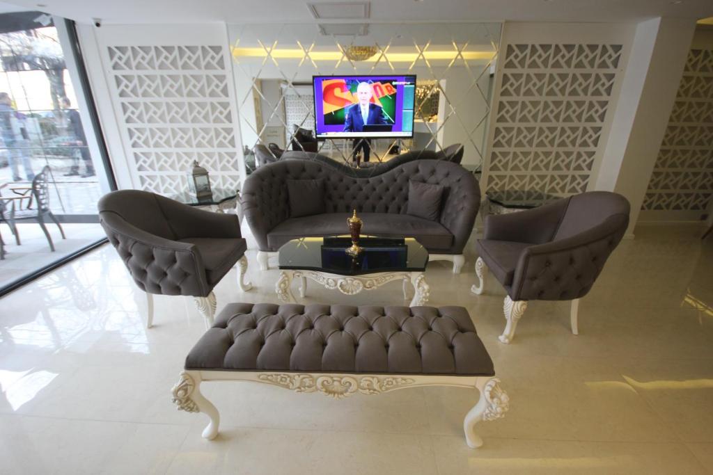 TV a/nebo společenská místnost v ubytování Ankara Gold Hotel
