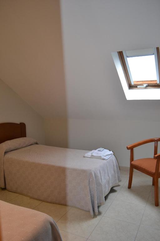 Posteľ alebo postele v izbe v ubytovaní Hostal Galicia Arteixo