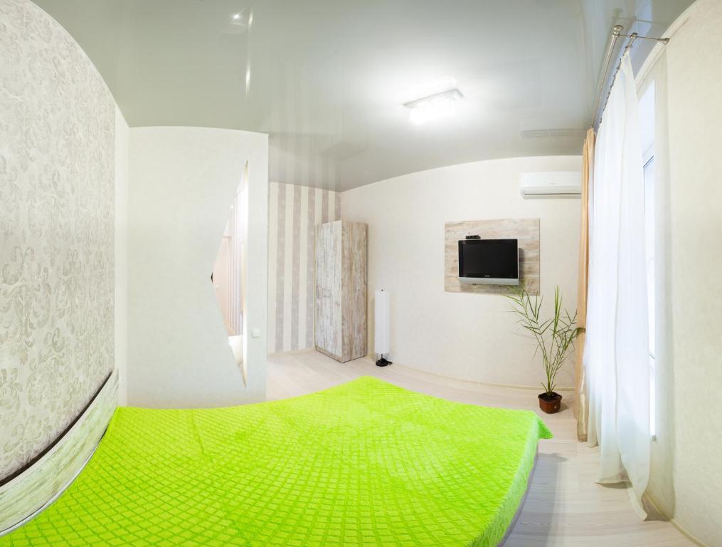 TV a/nebo společenská místnost v ubytování Sumskaya ApartHotel