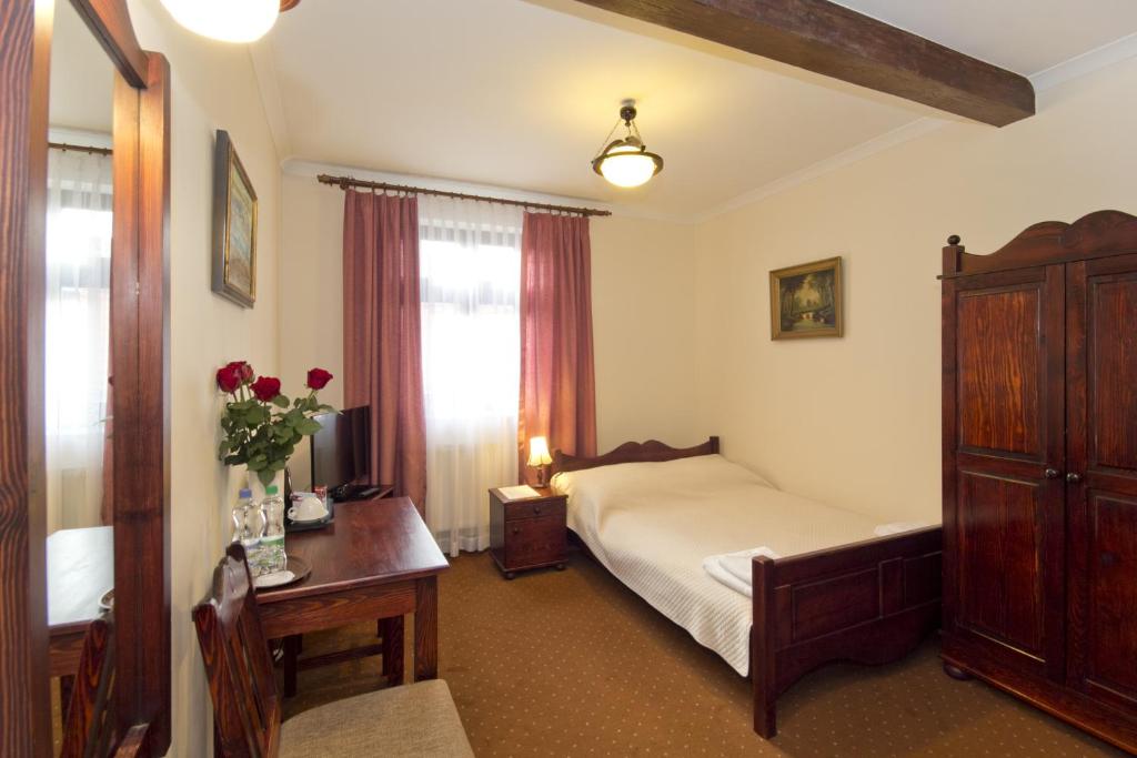 Postel nebo postele na pokoji v ubytování Hotel Retman
