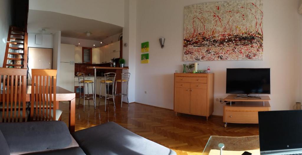Televízia a/alebo spoločenská miestnosť v ubytovaní Apartment Wenus