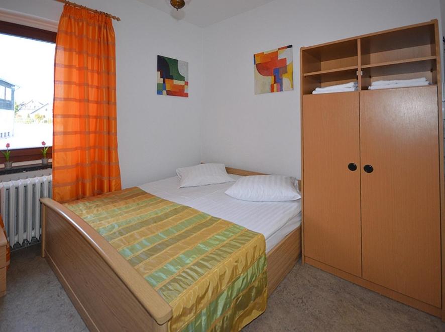 Postel nebo postele na pokoji v ubytování Hotel & Hostel Drei Bären